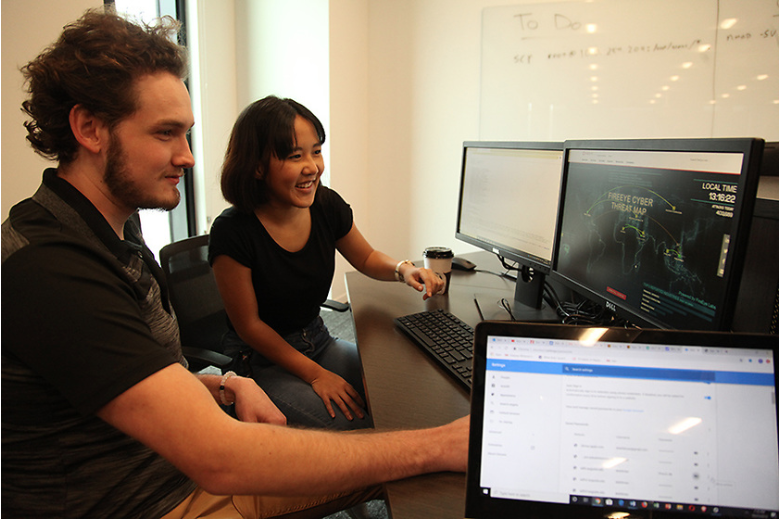 students looking at a computer screen