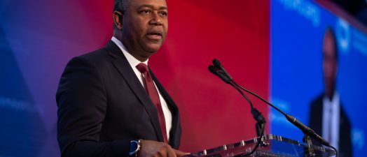 man talking on stage