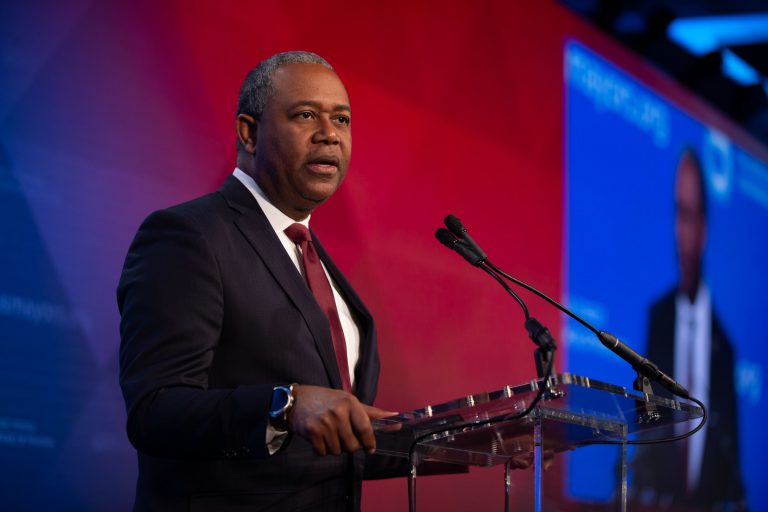 man talking on stage