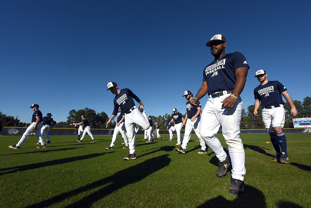 Baseball players stretching