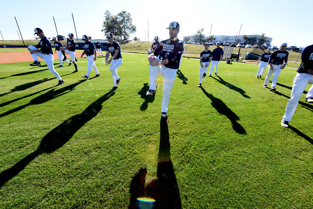 Baseball players exercising