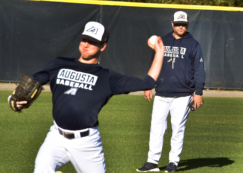 Baseball player throwing ball