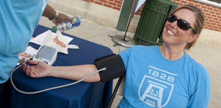 woman checking blood pressure