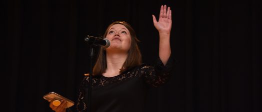 Woman reaching up