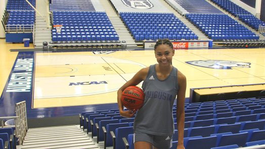 Woman holding a basketball