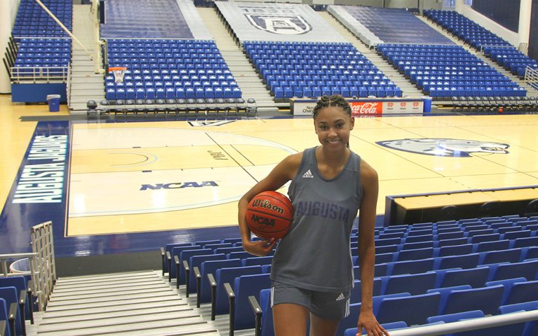 Woman holding a basketball
