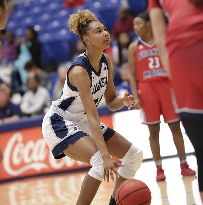 Player dribbling a basketball