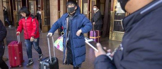 travelers with masks