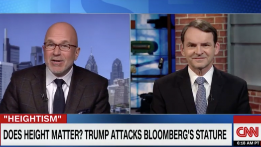 Two men talking on television.