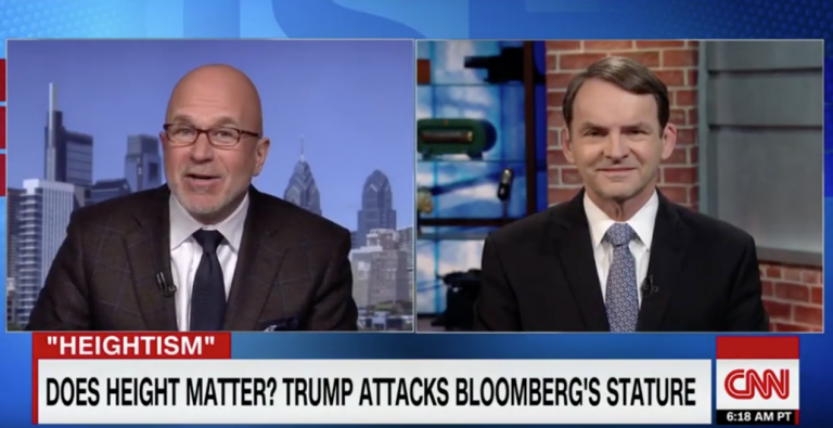 Two men talking on television.