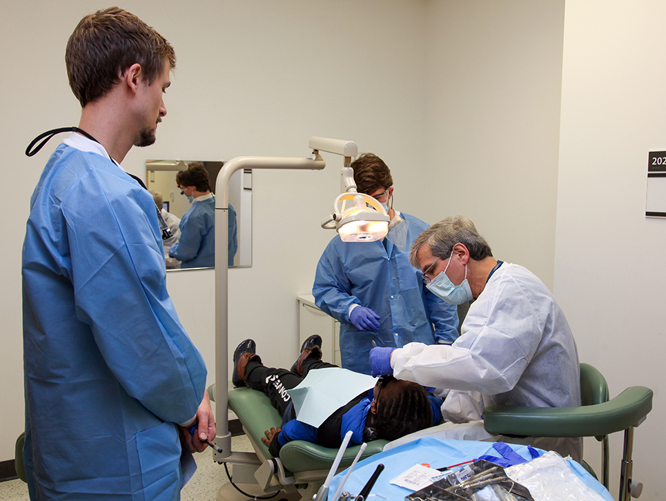 Students, dentist, work on a student