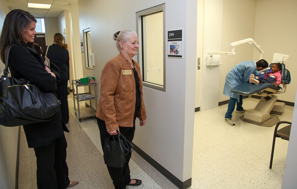 Women watching dental care