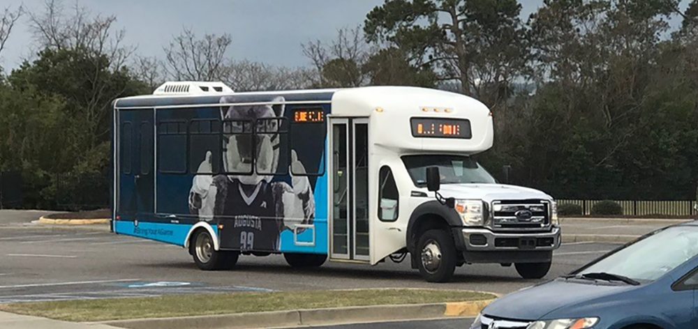 Shuttle bus with painted Jaguar mascot