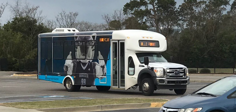 Shuttle bus with painted Jaguar mascot