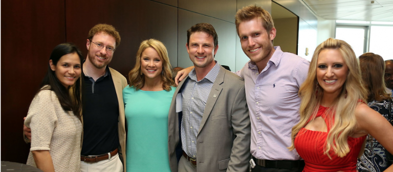 man and women smiling