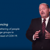 Screen shot of man talking