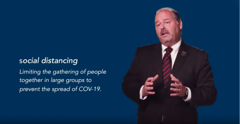 Screen shot of man talking