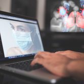 Laptop, woman with mask