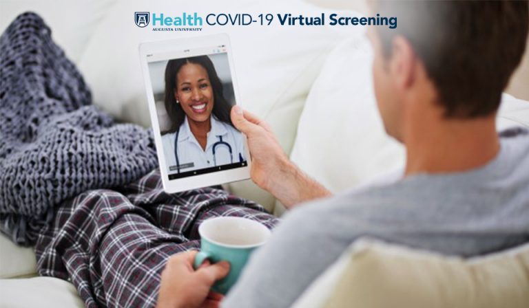 Man holding tablet talking to doctor