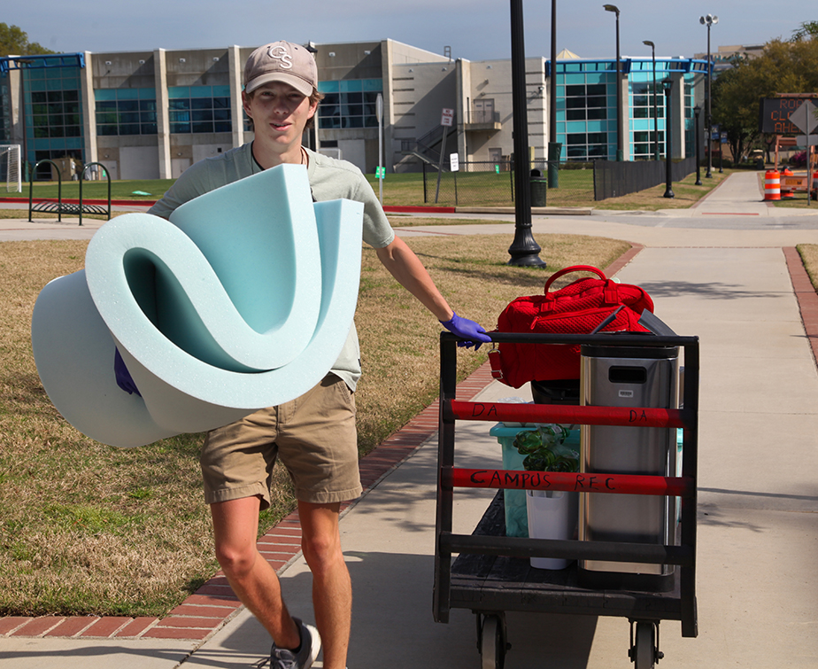 man holding luggage