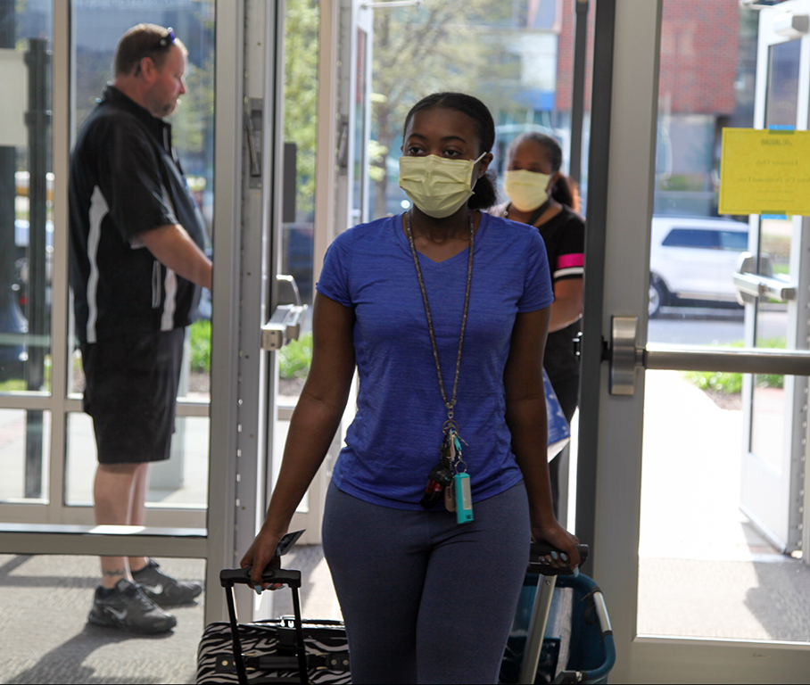 people walking with face masks