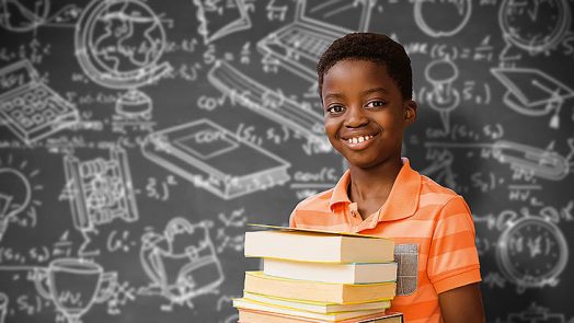 Boy holding books