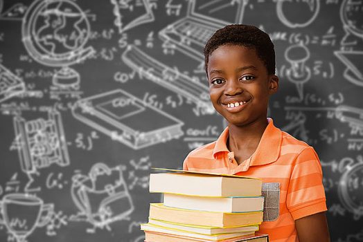 Boy holding books