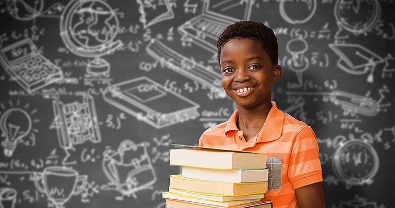 Boy holding books