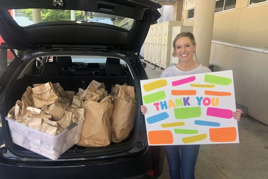 Woman holding a sign