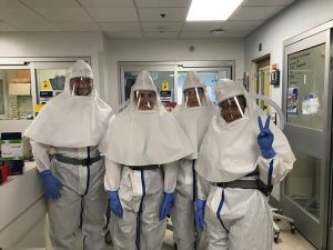 Nurses in protective suits