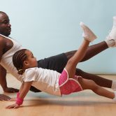 Father and child exercising