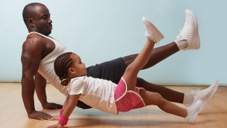 Father and child exercising