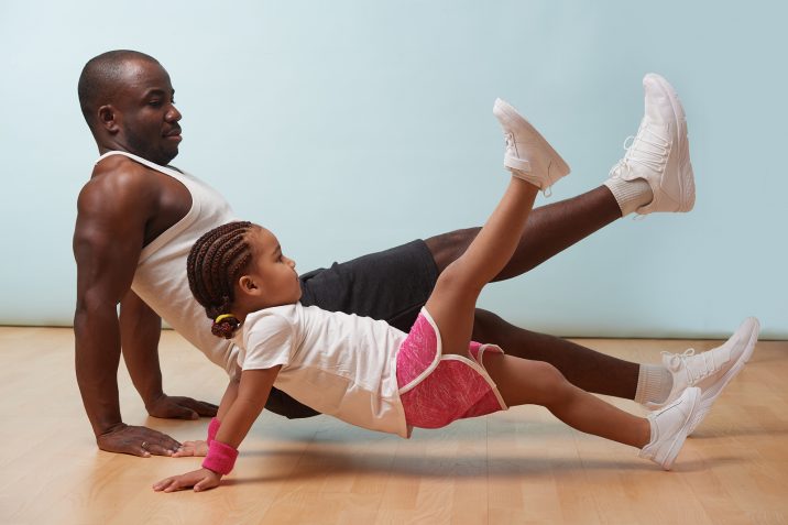 Father and child exercising