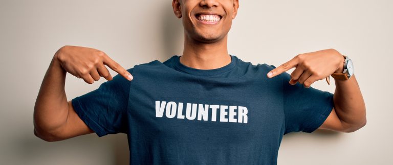 Man in volunteer shirt