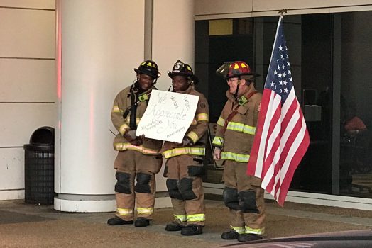 Firefighters with flag