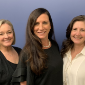 three women dressed nicely