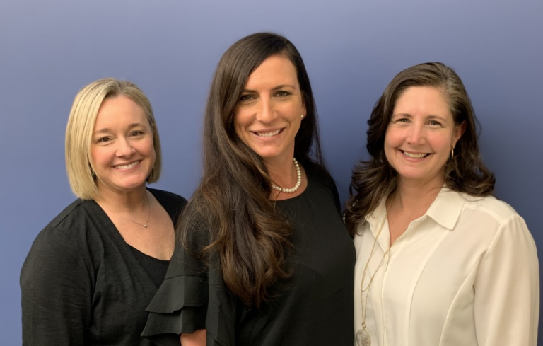 three women dressed nicely