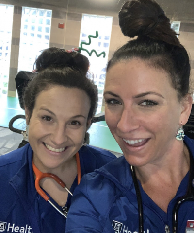 two nurses in scrubs
