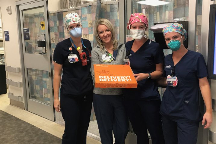 nurses with pizza box