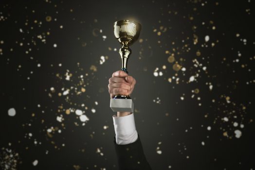 Trophy in hand
