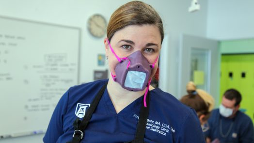 Woman wearing a face mask.