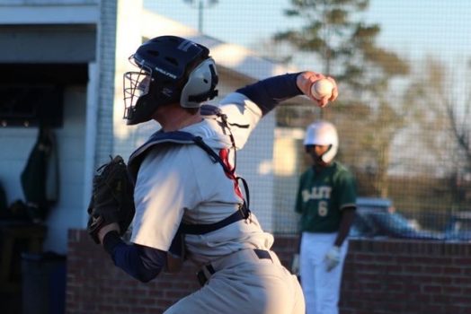 man throwing baseball
