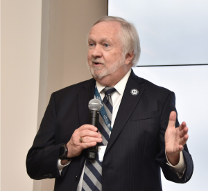 man speaking in microphone