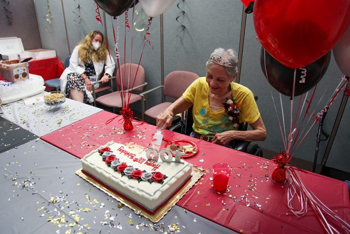 woman cutting cake