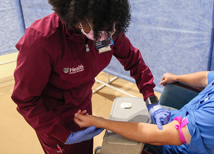 Nurse doing blood test