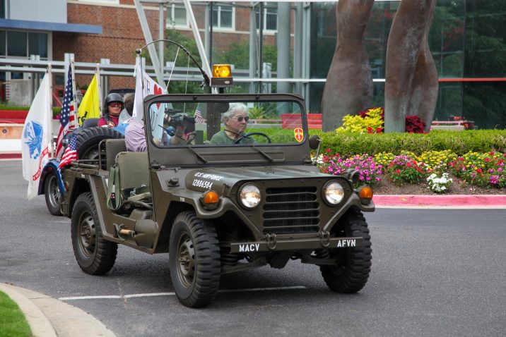 man in military truck