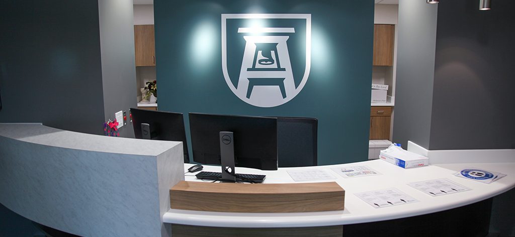 front desk with AU logo