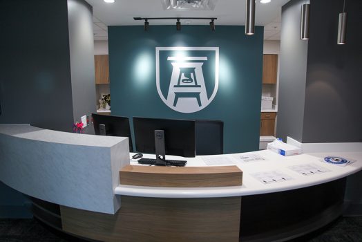 front desk with AU logo
