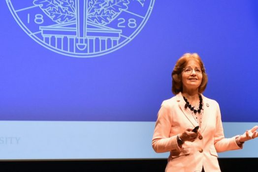 Woman in front of podium