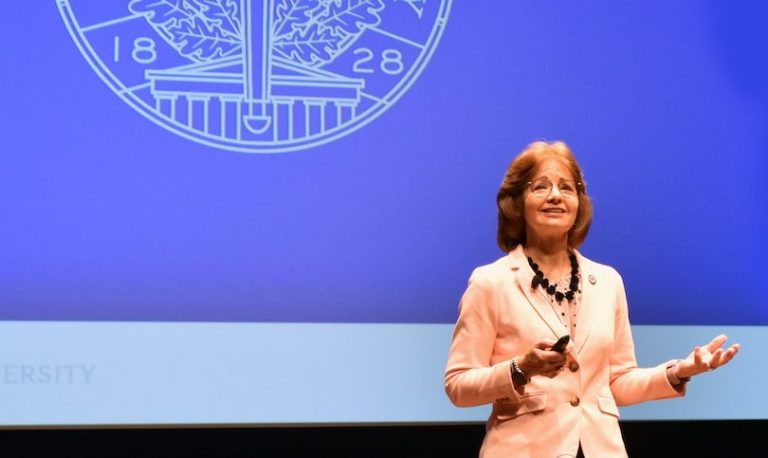 Woman in front of podium